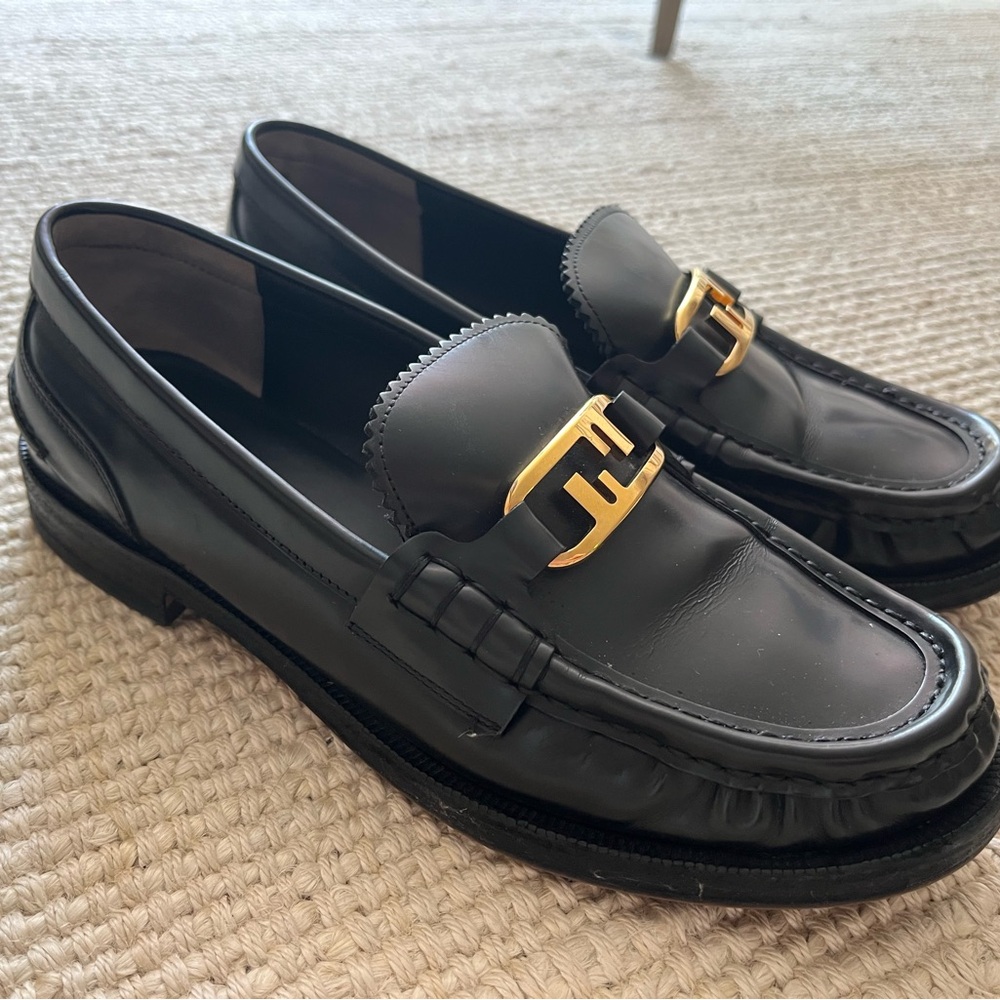 Fendi black loafers with scalloped edge tongue